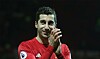 Manchester United sletter billede af Mkhitaryan i deres nye trøje, fordi han har taget lidt for meget på i ferien