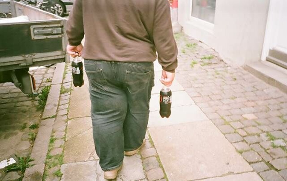 Vesterbro har tatoveringer i ansigtet og fotografer på gaden